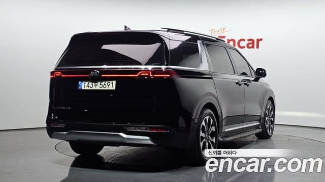 Kia Carnival 2021 — ფოტო 4/20