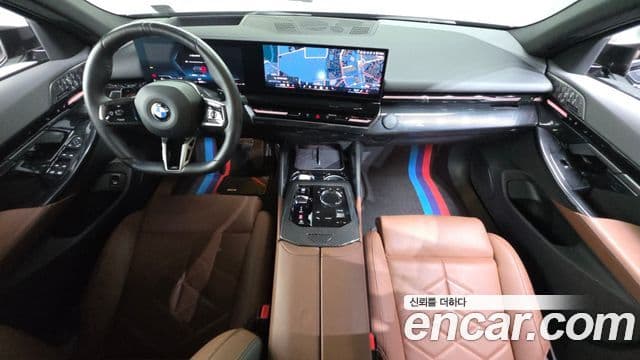 BMW 5 Series 2024 — ფოტო 7/20