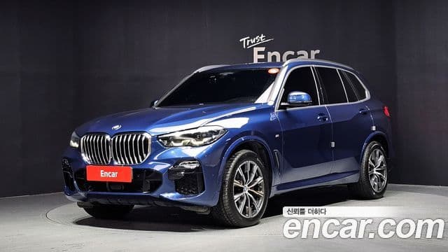 BMW X5 2021 — ფოტო 1/20