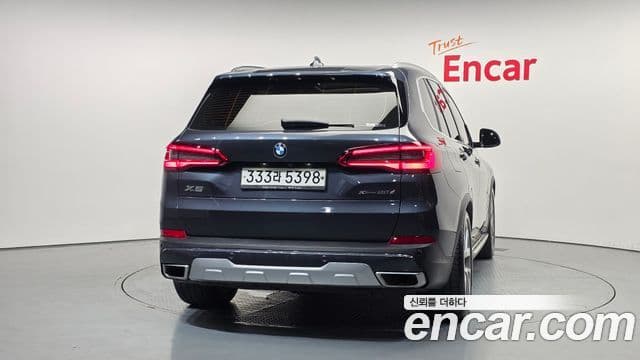 BMW X5 2020 — ფოტო 4/20