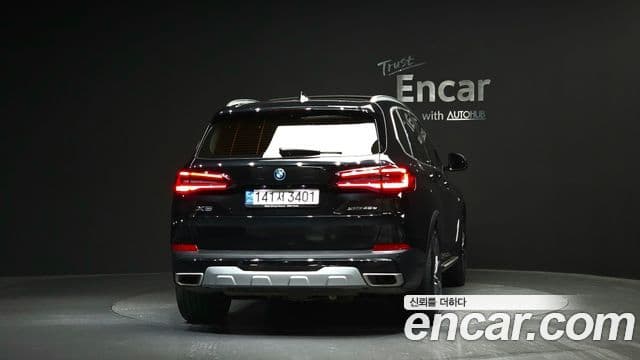 BMW X5 2021 — ფოტო 4/20