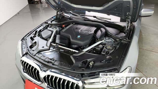 BMW 5 Series 2023 — ფოტო 5/20