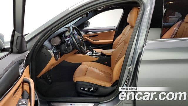 BMW 5 Series 2023 — ფოტო 8/20