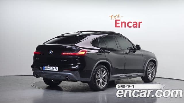 BMW X4 2021 — Фото 1/20