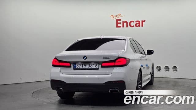 BMW 5 Series 2023 — ფოტო 4/20
