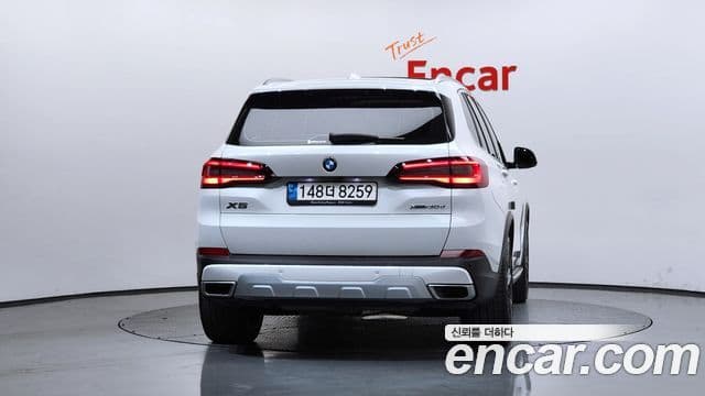 BMW X5 2022 — ფოტო 4/20