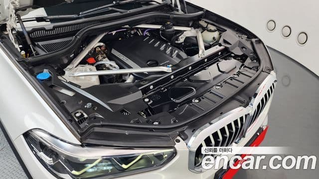 BMW X5 2022 — ფოტო 6/20