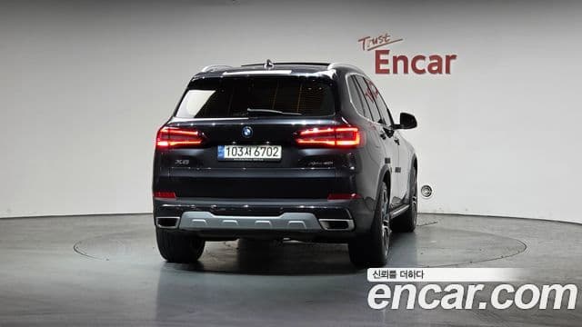 BMW X5 2022 — ფოტო 4/20