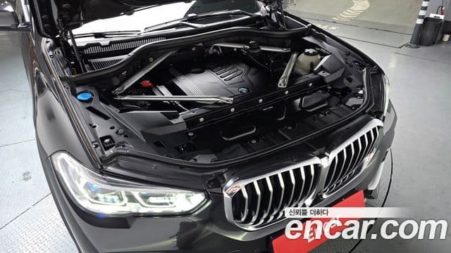 BMW X5 2022 — ფოტო 6/20