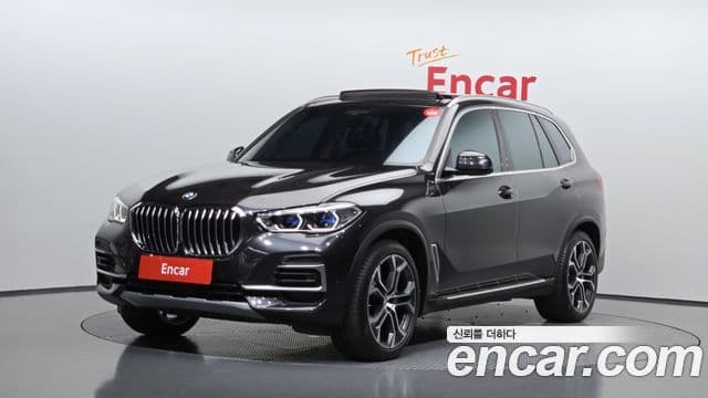 BMW X5 2023 — Фото 1/20
