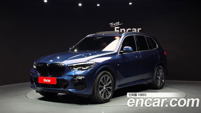 BMW X5 2019 — ფოტო 1/20