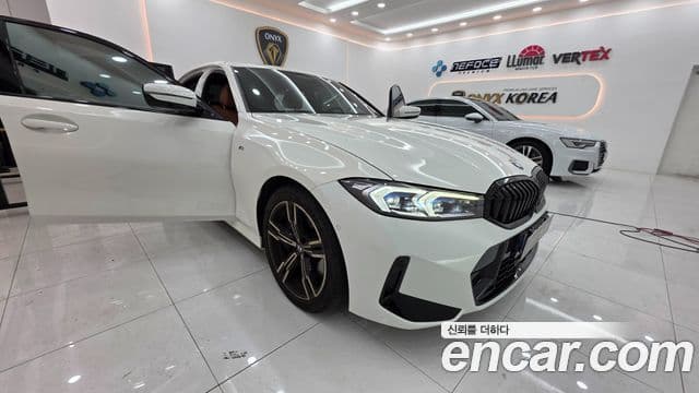 BMW 3 Series 2023 — ფოტო 1/13