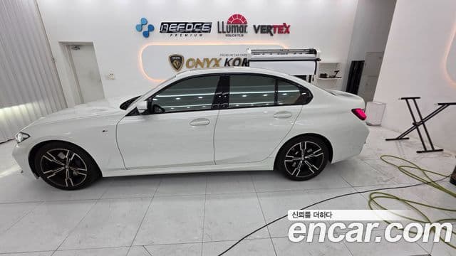BMW 3 Series 2023 — ფოტო 11/13