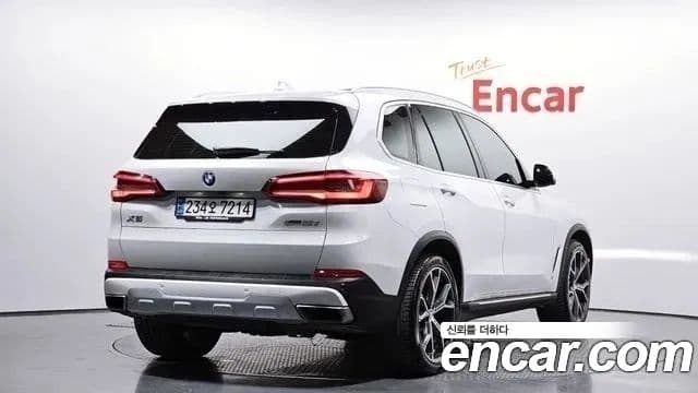BMW X5 2019 — ფოტო 1/20