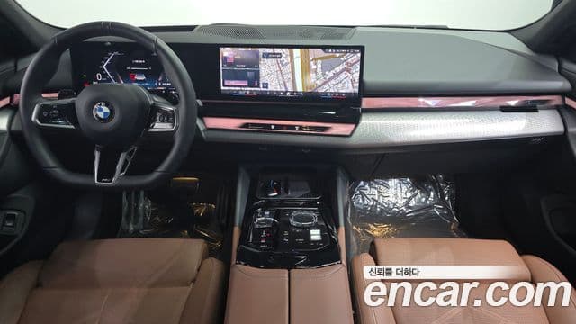BMW 5 Series 2024 — ფოტო 7/20