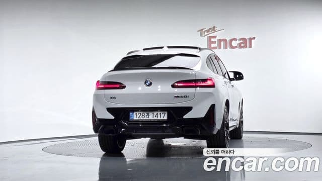 BMW X4 2022 — ფოტო 4/20