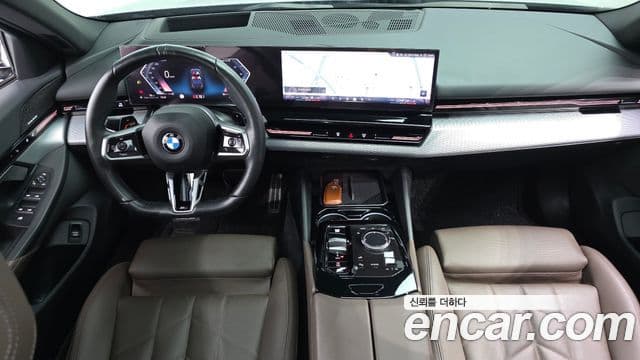 BMW 5 Series 2023 — ფოტო 7/20