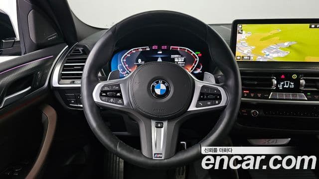 BMW X4 2025 — ფოტო 14/20