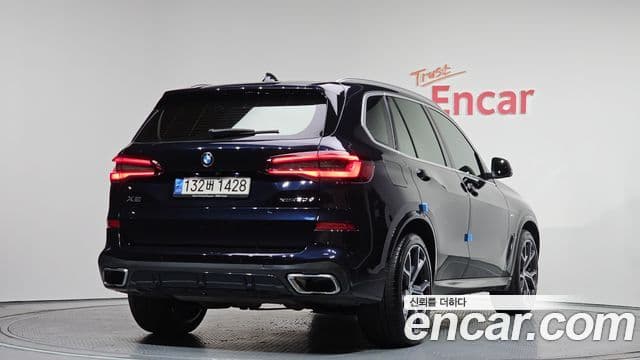 BMW X5 2022 — ფოტო 1/20