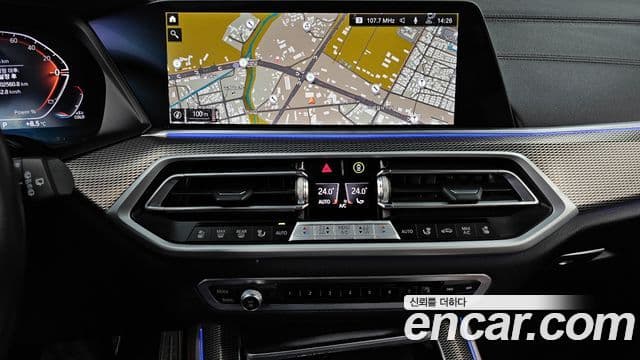 BMW X5 2022 — ფოტო 14/20