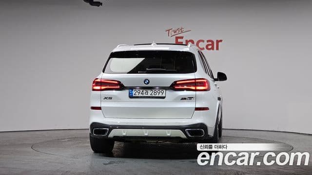 BMW X5 2022 — ფოტო 4/20