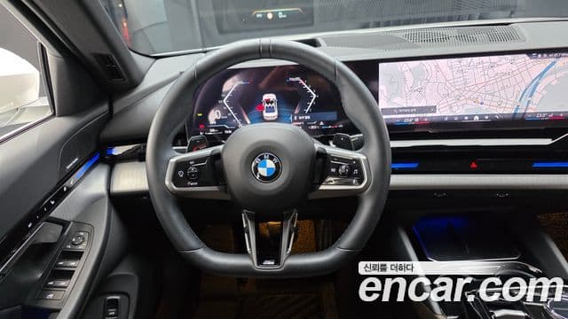 BMW 5 Series 2024 — ფოტო 13/20