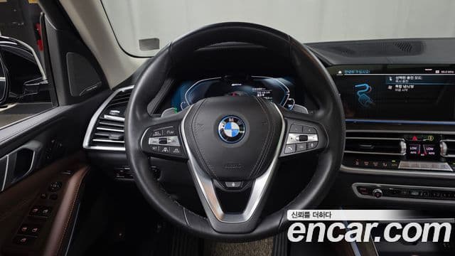 BMW X5 2021 — ფოტო 14/20
