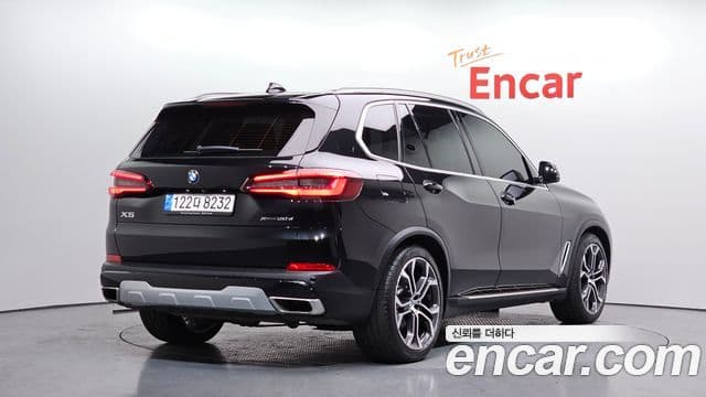 BMW X5 2022 — ფოტო 1/20