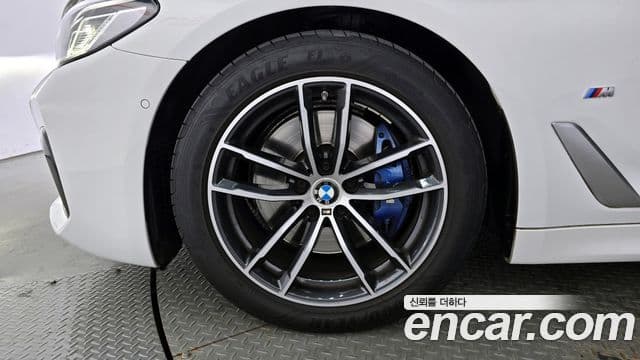 BMW 5 Series 2023 — ფოტო 5/20