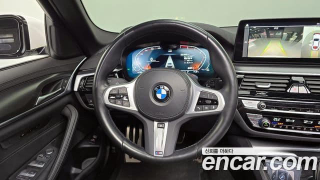 BMW 5 Series 2023 — ფოტო 14/20