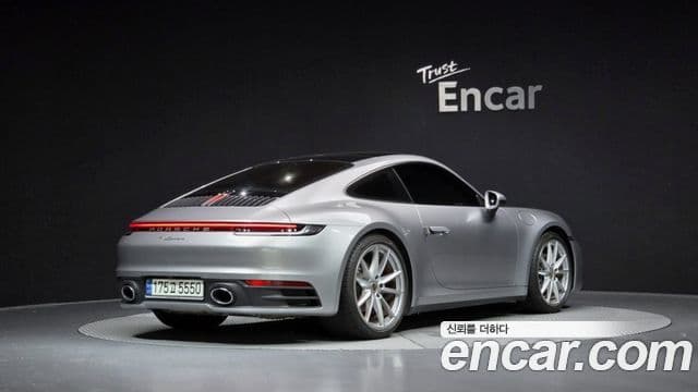 Porsche 911 2021 — Фото 1/20