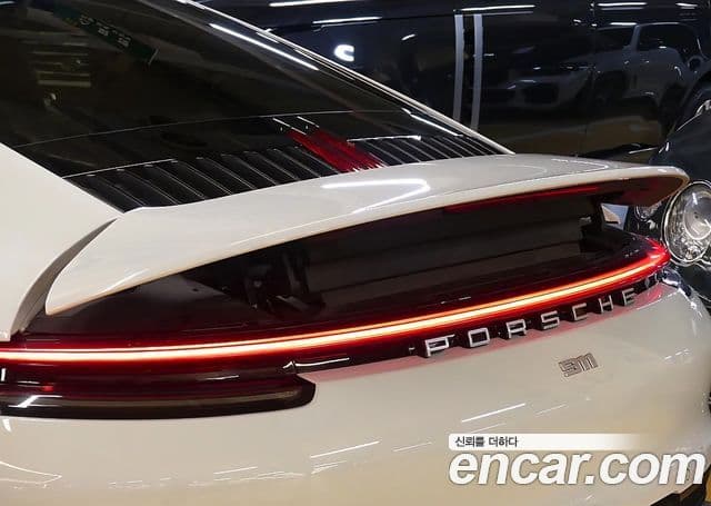 Porsche 911 2021 — Фото 19/20
