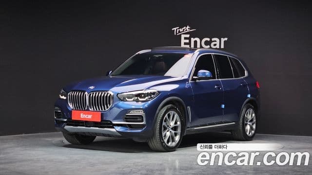 BMW X5 2019 — ფოტო 1/20