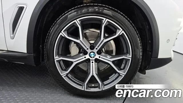 BMW X5 2019 — ფოტო 4/20