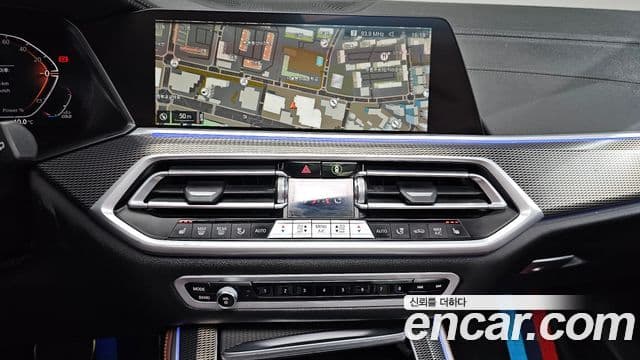 BMW X5 2022 — ფოტო 14/20