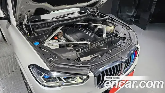 BMW X5 2023 — ფოტო 9/20