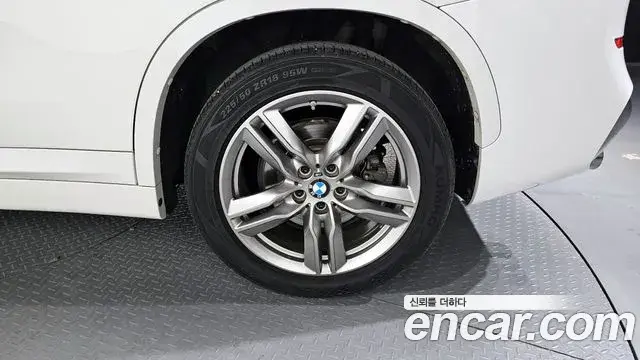 BMW X1 2021 — ფოტო 16/20