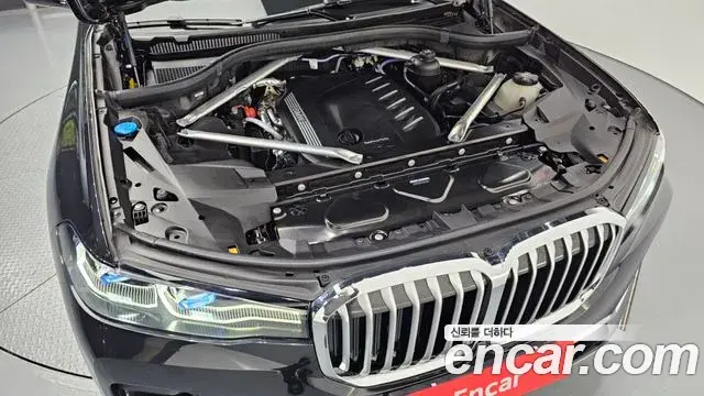 BMW X7 2022 — ფოტო 14/20