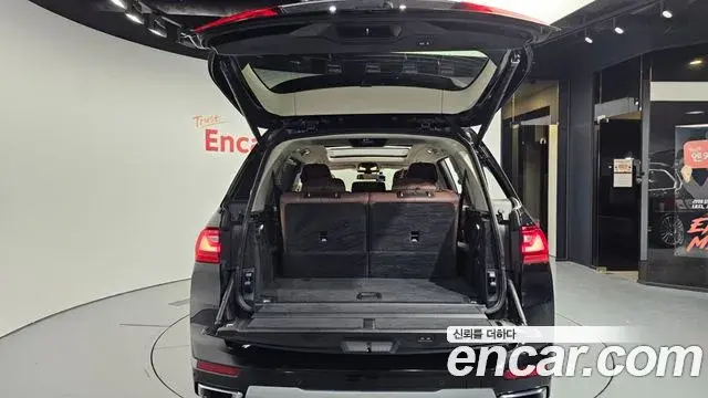 BMW X7 2022 — ფოტო 8/20
