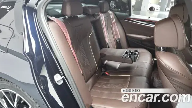 BMW 5 Series 2023 — Фото 12/20