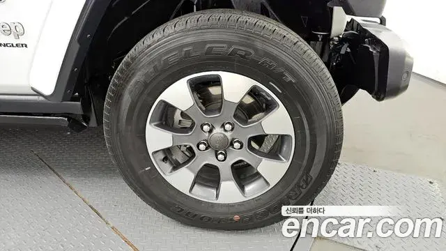 Jeep Wrangler 2023 — ფოტო 16/20