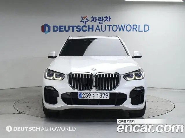 BMW X5 2021 — ფოტო 17/20