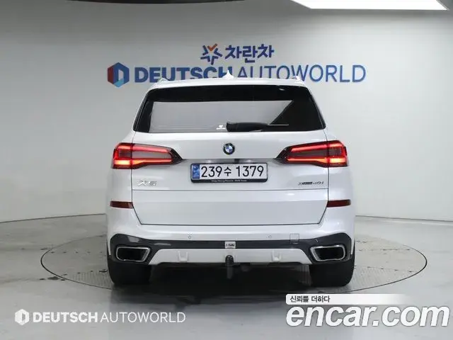 BMW X5 2021 — ფოტო 19/20