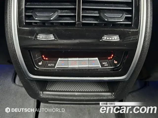 BMW X5 2021 — ფოტო 15/20