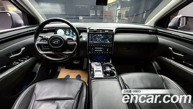 Hyundai Tucson Hybrid 2021 — ფოტო 18/20