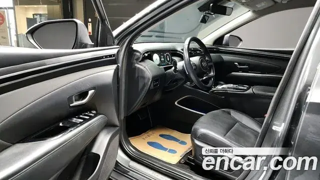 Hyundai Tucson Hybrid 2021 — ფოტო 6/20