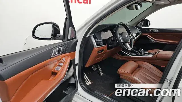 BMW X7 2021 — ფოტო 7/20