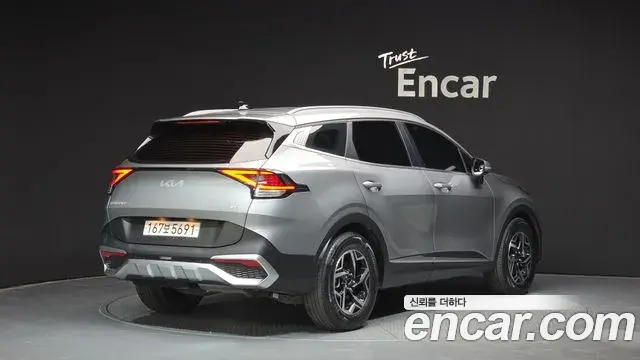 Kia Sportage 2021 — ფოტო 7/20