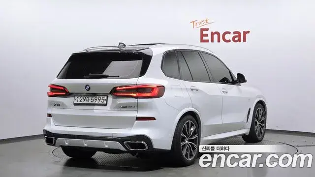 BMW X5 2019 — Фото 1/20