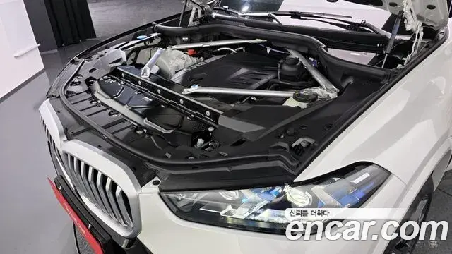 BMW X5 2025 — ფოტო 13/20